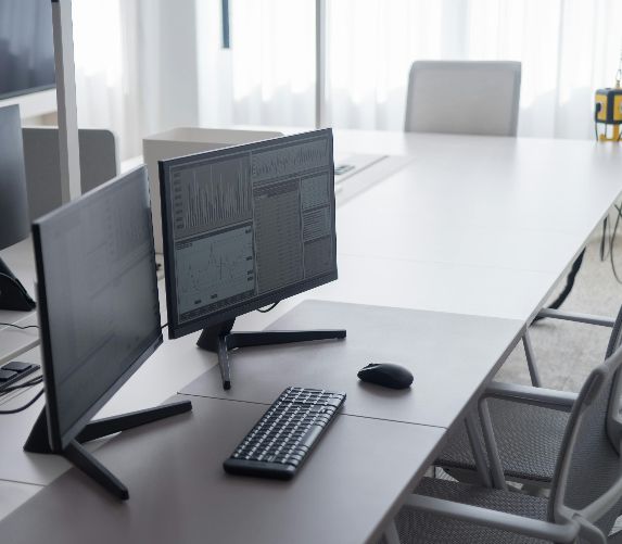 Image of a desktop computer featuring online SQE1 Practice Questions